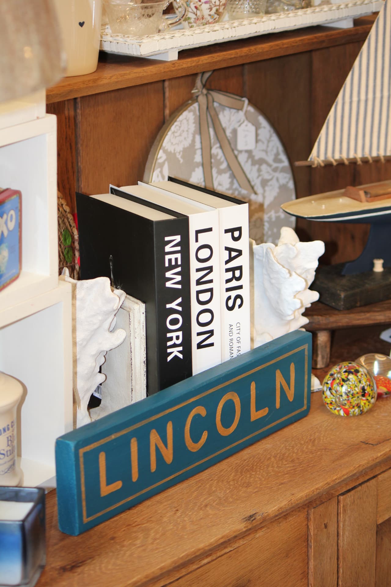 Vintage finds styled on an oak dresser